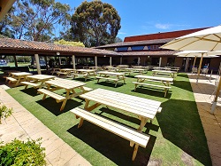 Corporate function hiring out picnic tables