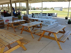 Many oiled picnic tables at the Secret Harbour Golf Links in Mandurah, Western Australia