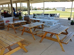 Many picnic tables at The Secret Harbour Golf Links