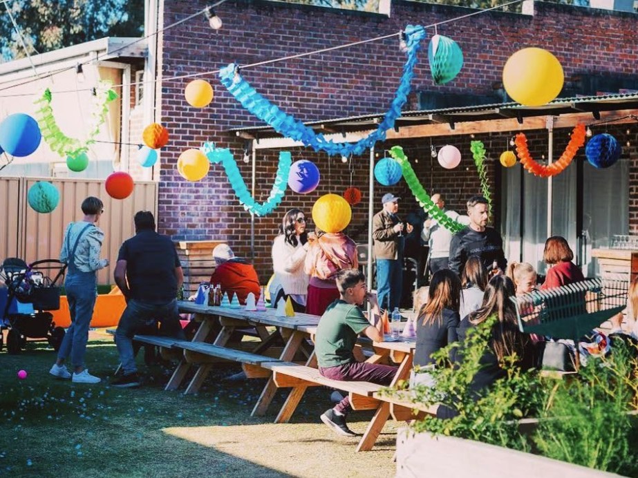 People celebrating using Picnic tables in Sydney Newcastle