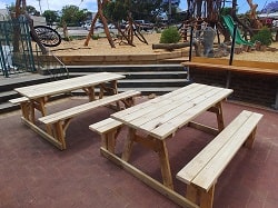 connected_bench_with_picnic_table_at_a_park.jpg