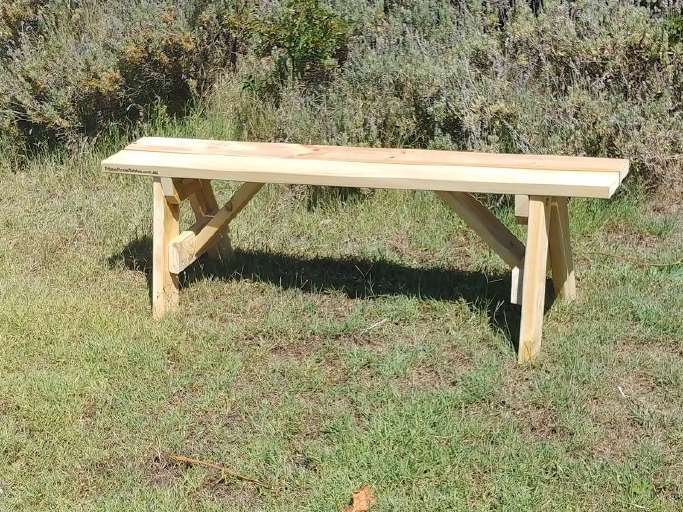 Seating bench with angled legs